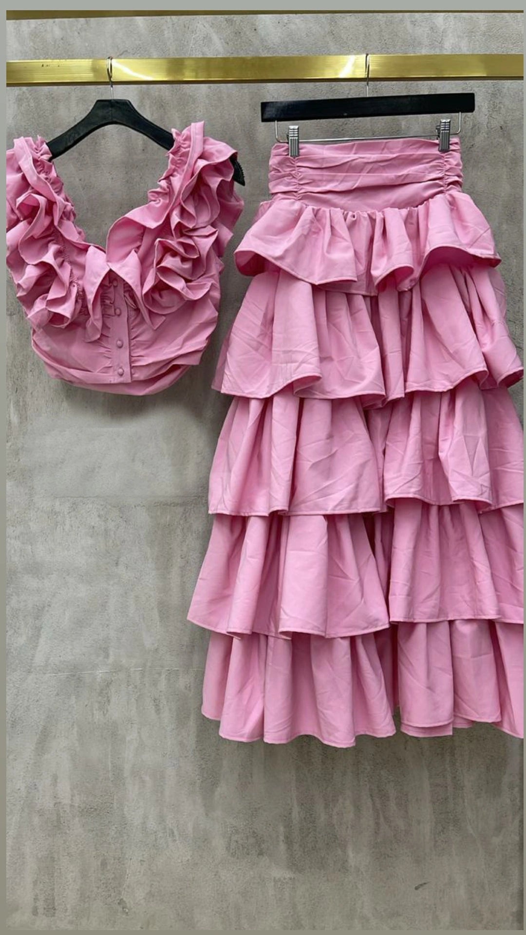 Set falda y top rosa volantes