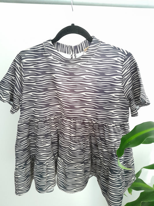 Blusa estampada zebra